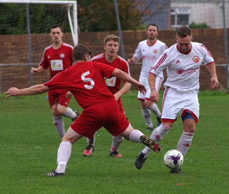 Dorian Davies scored for The Dragons who dropped points at Marble Hall